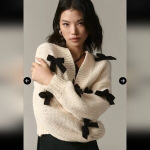 Anthropologie Maeve Cream Sweater with Black Bow Accents Alicia 3D Cardigan